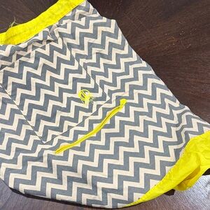 Dabney Lee 
large laundry Chevron Patterned Bag with Yellow Accents